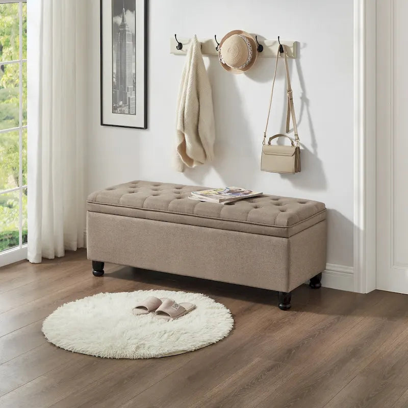 Panca contenitore con seduta trapuntata e gambe in legno