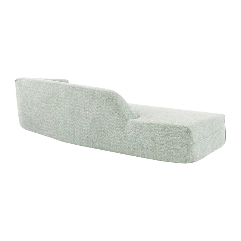 Divano curvo a chaise longue in tessuto bouclé