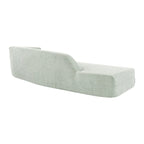 Divano curvo a chaise longue in tessuto bouclé