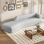 Divano curvo a chaise longue in tessuto bouclé
