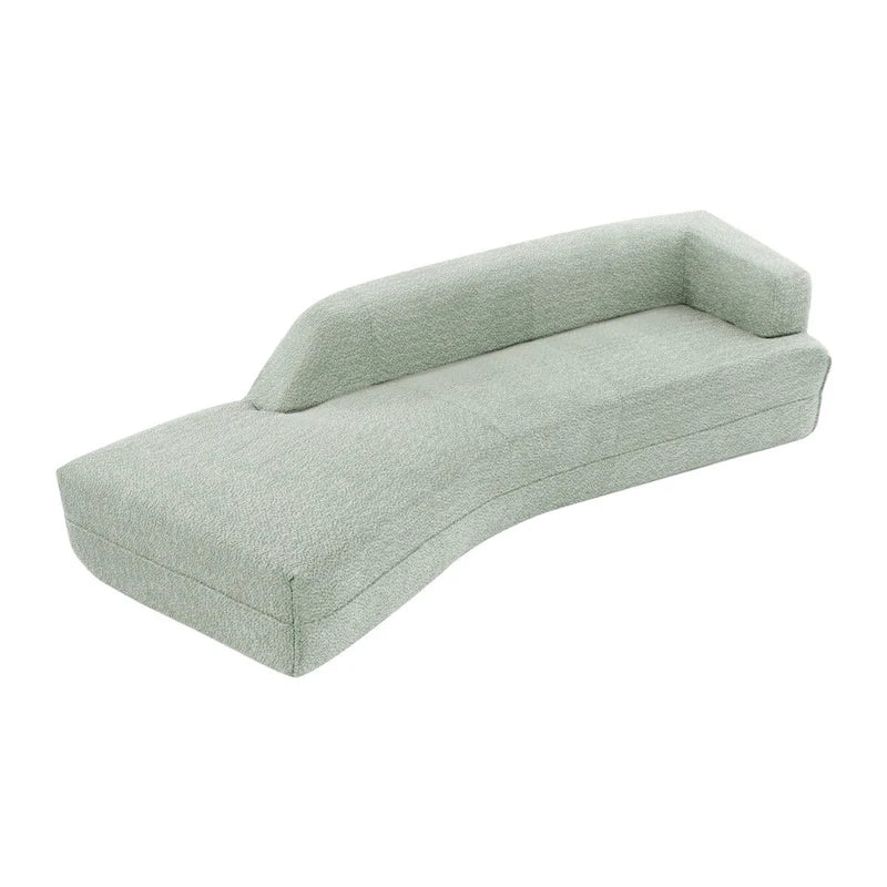 Divano curvo a chaise longue in tessuto bouclé