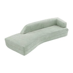 Divano curvo a chaise longue in tessuto bouclé