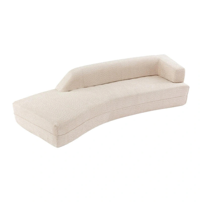 Divano curvo a chaise longue in tessuto bouclé